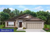 Charming single-story home with a two-car garage, well-maintained lawn, and tasteful shutters at 4869 Sutherland St # Lot 55, Spring Hill, FL 34609