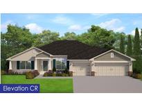 Charming single-story home with a manicured lawn, two-car garage, and welcoming front porch at 13362 Quigley Ave, Weeki Wachee, FL 34614