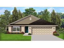 Charming single-story home featuring a two-car garage, craftsman shutters, and lush landscaping in front at 4894 Sutherland St # Lot 65, Spring Hill, FL 34609