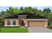 Tan single-story home featuring a 2-car garage, neutral trim, and a well-manicured lawn with flowering bushes at 5504 Ocean Breeze Dr, Spring Hill, FL 34609