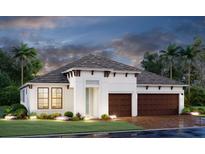 Two-story home with two-car garage and landscaping at 4605 Sweet Retreat Run, Bradenton, FL 34211