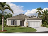 Charming single-story home with a two-car garage, beautiful lawn, and palm trees at 9876 Last Light Gln, Parrish, FL 34219
