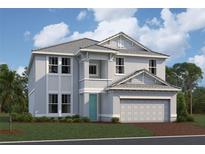 Charming two-story home with a two-car garage, elegant gray exterior, and a lush green lawn at 7575 Hawkstone Dr, Sarasota, FL 34241