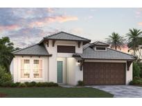 Charming one-story home featuring a two car garage, Bahama shutters and a well-maintained lawn at 200 Vistera Blvd, North Venice, FL 34275