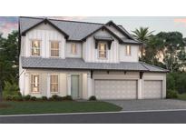 Charming two-story home with white siding, gray roof, three-car garage, and well-maintained landscaping at 7562 Seahawk Ave, Sarasota, FL 34241
