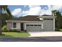 Charming single-story home with a three-car garage and stone accents on the facade at 9005 Players Dr, Weeki Wachee, FL 34613