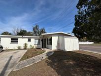Charming single-story home featuring a well-maintained front yard and cozy entrance at 147 Melanie Ln, Brandon, FL 33510