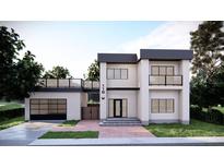 Modern two-story home with a sleek design and rooftop deck at 110 W Floribraska Ave, Tampa, FL 33603