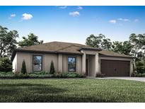 One-story home with tan exterior, brown garage door, and manicured landscaping at 5952 Gillot Blvd, Port Charlotte, FL 33981