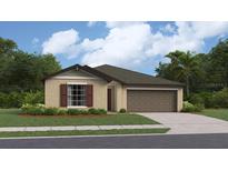 One-story home with attached garage and landscaping at 11222 Linden Depot Rd, San Antonio, FL 33576