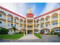 Spanish style building exterior with multiple levels and balconies at 2431 Franciscan Dr # 49, Clearwater, FL 33763