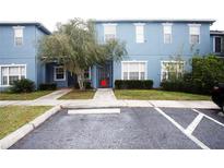 Two-story blue building with parking at 12811 Kings Crossing Dr, Gibsonton, FL 33534