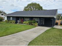 Charming single-story home features a well-maintained lawn and inviting curb appeal at 1006 39Th W Ave, Bradenton, FL 34205