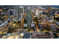 Stunning aerial view of cityscape at night with skyscrapers and city lights at 777 N Ashley Dr # 2601, Tampa, FL 33602