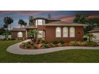 Two-story house with landscaped yard, walkway, and attached garage at 849 John Cressler Dr, Seffner, FL 33584