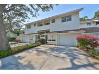 White two-story home with attached garage and landscaping at 5203 Bayshore Blvd # 6, Tampa, FL 33611