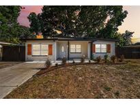 Newly renovated home with modern shutters and landscaping at 5061 Jasmine Cir, St Petersburg, FL 33714