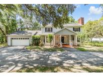 Charming two-story home with an attached two-car garage and beautifully landscaped front yard at 6605 Pemberton Sage Ct, Seffner, FL 33584