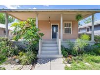 Charming bungalow with a covered front porch at 1207 E 17Th Ave, Tampa, FL 33605
