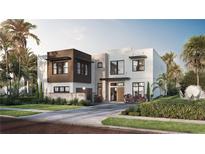 Modern two-story home featuring a manicured lawn, minimalist landscaping, and a unique architectural design at 4305 W Zelar St, Tampa, FL 33629