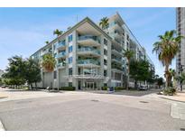 Modern building exterior with street level retail at 912 Channelside Dr # 2316, Tampa, FL 33602