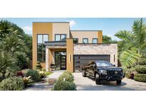 Modern two-story house with attached garage and landscaping at 5223 29Th S Ave, St Petersburg, FL 33707