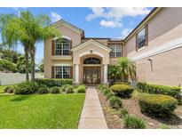 Two-story house with columns and landscaping at 212 Excalibur Ct, Brandon, FL 33511