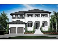 Two story house with gray roof and attached garage at 4519 W Culbreath Ave, Tampa, FL 33609