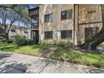 Exterior view of condo building at 11812 Raintree Lake Ln # B, Tampa, FL 33617
