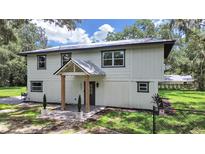 Charming two-story home with covered entryway at 6902 E 29Th Ave, Tampa, FL 33619