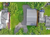Aerial view of a lot with a large metal building at 2395 19Th St, Sarasota, FL 34234