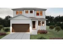 Two-story house with brown garage door and light-colored exterior at Lot 95 Bird St., Tampa, FL 33604