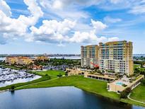 High-rise condo building near water with parking at 140 Riviera Dunes Way # 303, Palmetto, FL 34221