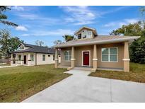 Newly built home with a modern exterior at 3410 E Henry Ave, Tampa, FL 33610