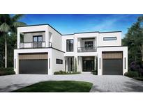 Modern two-story house with two-car garage and balcony at 1904 S Cardenas Ave, Tampa, FL 33629