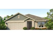 One-story home with a gray and beige color scheme and a two-car garage at 11125 40Th E Ave, Palmetto, FL 34221