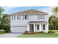 Two story home with gray siding, gray roof, and landscaping at 18227 Fattoria Ter, Lakewood Ranch, FL 34211