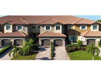 Luxury townhouses with tile roofs and garages at 13506 Messina Loop # 105, Bradenton, FL 34211