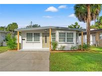 Charming renovated home with a landscaped yard at 3066 Highland N St, St Petersburg, FL 33704