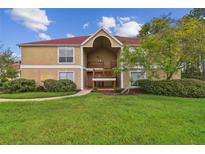 Front view of the condo building showcasing its attractive exterior at 9481 Highland Oak Dr # 1615, Tampa, FL 33647