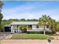 Charming single story home with modern updates and a fenced yard at 9913 Alavista Dr, Gibsonton, FL 33534