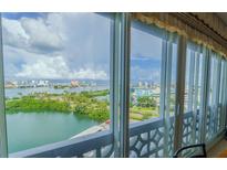 Stunning water views from the floor-to-ceiling windows in this bright, waterfront condo at 31 Island Way # 907, Clearwater Beach, FL 33767
