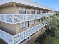 Apartment building with balconies and geometric designs at 5095 Bay Ne St # 306, St Petersburg, FL 33703