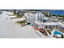 Aerial view of beachfront property with pool and ocean views at 4950 Gulf Blvd # 104, St Pete Beach, FL 33706
