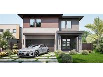 Modern two-story house with a gray exterior and a two-car garage at 5221 29Th S Ave, St Petersburg, FL 33707