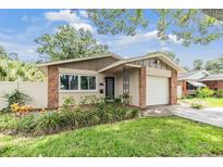 Updated Ranch style home with a landscaped front yard at 205 Se Monroe N Cir, St Petersburg, FL 33703
