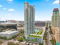 Aerial view of a modern high rise building in a city setting at 175 1St S St # 406, St Petersburg, FL 33701