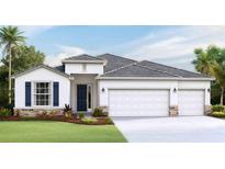 Two-story house with white siding, double garage, and landscaping at 4303 Pullet Ct, Lakewood Ranch, FL 34211