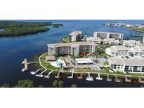 Aerial view of waterfront condo building at 8141 Aquila St # 315, Port Richey, FL 34668