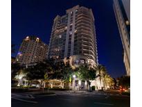 Night view of a modern high rise building at 450 Knights Run Ave # 702, Tampa, FL 33602